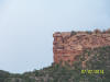 Stone face in the cliff along the Unaweep-Tabeguache Byway